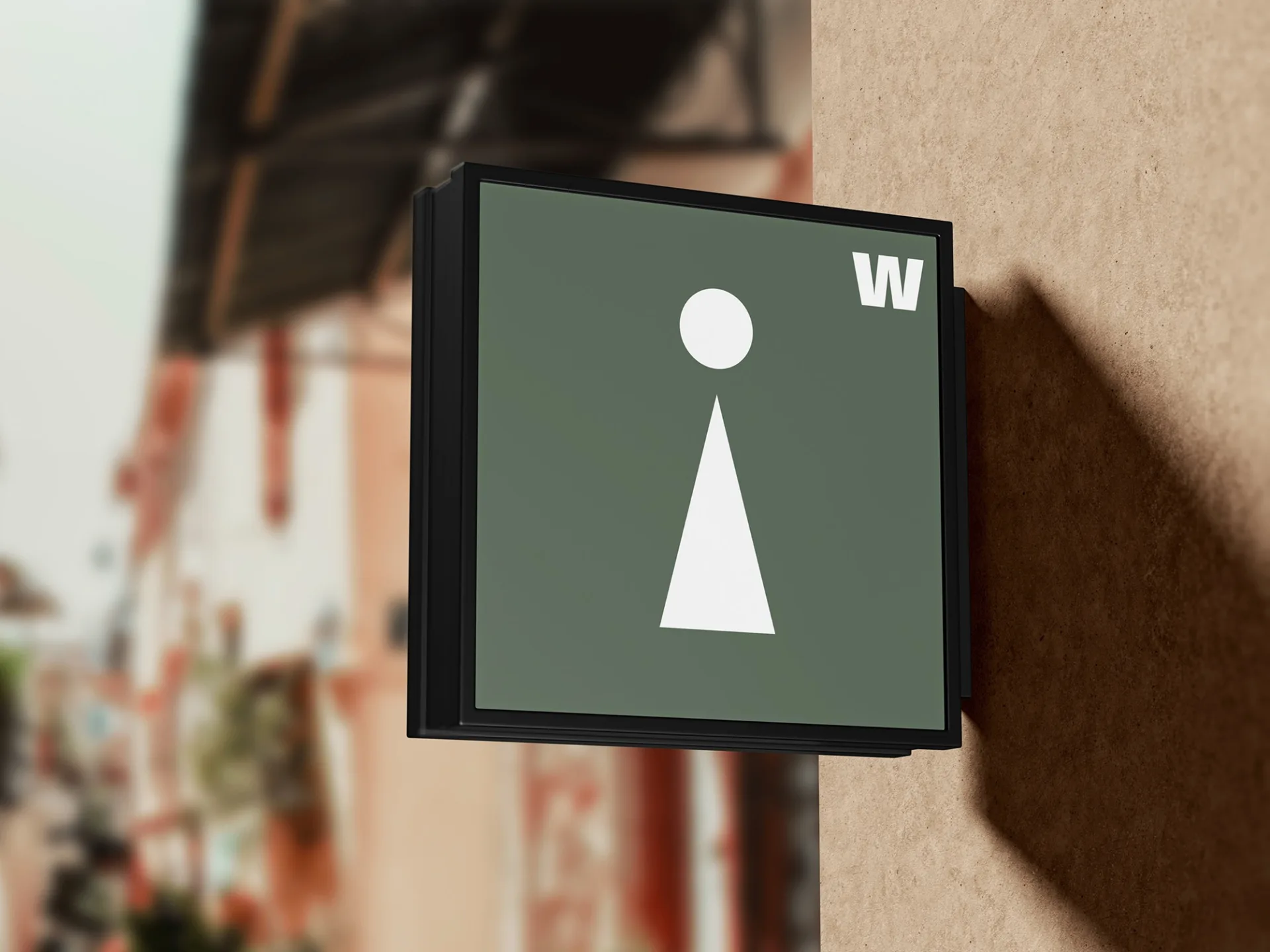 KHI KHI washroom signage design with olive green background and white geometric symbols maintaining brand consistency